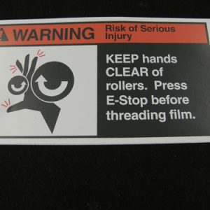 30018538 - LABEL REGULATORY ANSI WARNING 'KEEP AWAY FROM ROLLERS' (SIZE = 6.63 X 3.64)