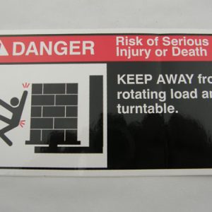 30022988 - LABEL REGULATORY ANSI DANGER 'KEEP AWAY FROM ROTATING LOAD AND TURNTABLE' (SIZE = 6.63 X 3.63)